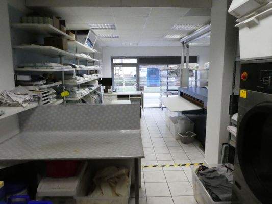 Textilreinigung und Heißmangel