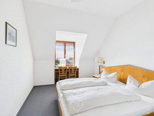 Doppelzimmer mit Doppelbett