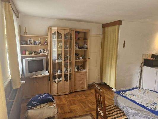 Wohnzimmer mit Küche im EG