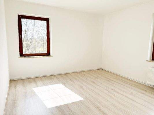 Schlafzimmer mit Blick Richtung Flurbereich