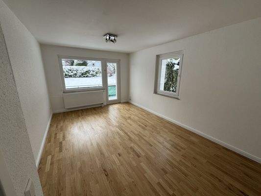 Wohnzimmer mit Balkon