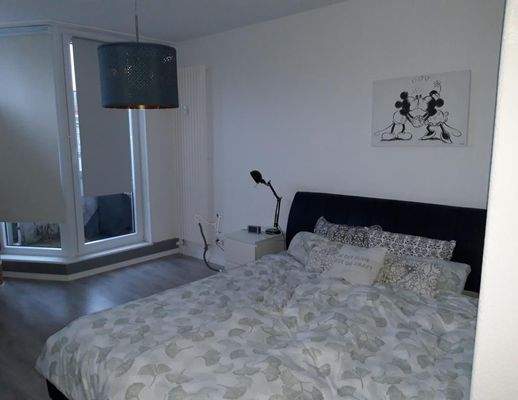 Schlafzimmer mit Balkon