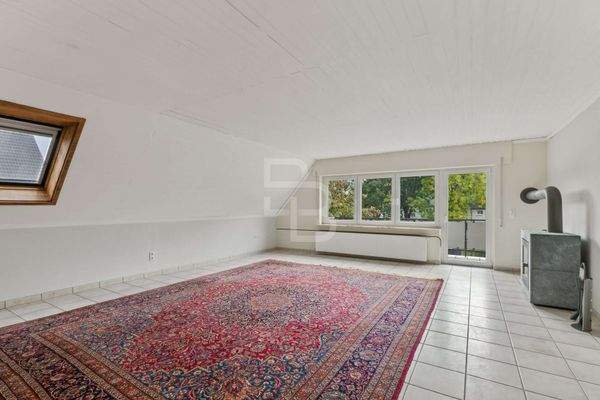 Wohnzimmer mit Balkon OG