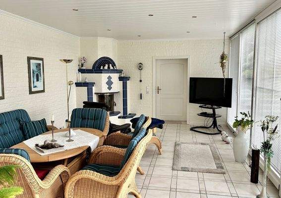 Wintergarten mit Kamin