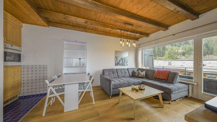 KITZIMMO-Dachgeschosswohnung an der Skipiste mit Kaiserblick kaufen - Immobilien Kitzbühel.