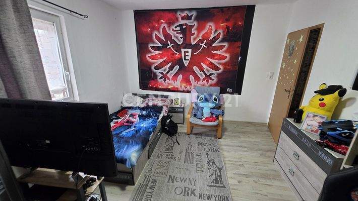 Gemütliches Kinderzimmer der Wohnung OG 