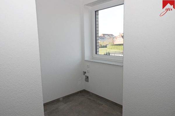 Hauswirtschaftsraum mit Waschmaschinenanschluss