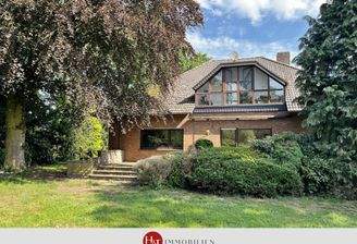 Haus zu verkaufen in Stuhr Groß Mackenstedt – H&T Immobilien - Zweifamilienhaus in Stuhr