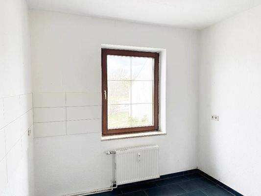 Küche mit Fliesenspiegel