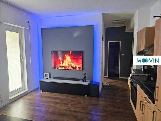 Ansicht I: Wohn- und Esszimmer mit offenem Küchenbereich