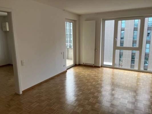 Wohn-/Essbereich mit Zugang zum Balkon