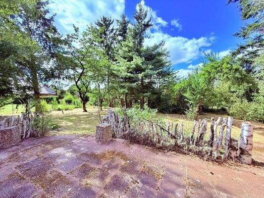 Gartenansicht gepflasterte Terrasse