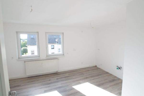 Wohnzimmer mit Küchenbereich