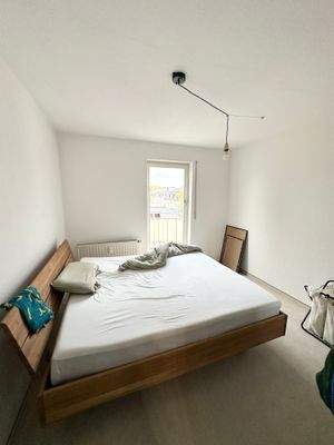 Schlafzimmer mit Balkon