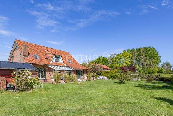 Mit Glas überdachter Terrassenbereich