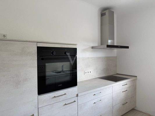 Küche mit Einbauküche (1)