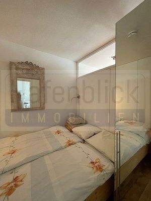 Schlafzimmer mit Oberlichtscheibe