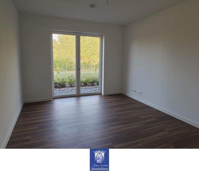Ihr neuer Wohntraum im attraktiven Neubau, große Terrasse, ruhige Lage mit viel Grün! - Foto 3