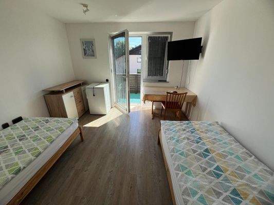 Zimmer 4 mit Balkon Wohnung 2