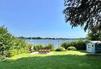 Gemeinschaftsgarten mit Bootsliegeplatz