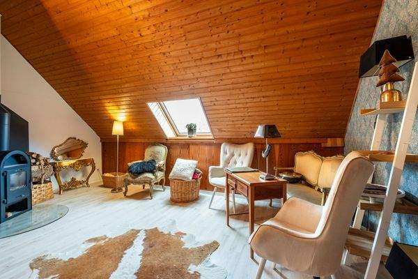 Dachstudio mit Kaminofen