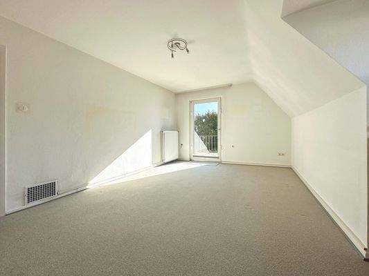 Schlafzimmmer mit Zugang zum Balkon