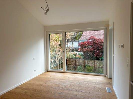 Schlafzimmer mit angrenzender Ankleide und Bad en Suite