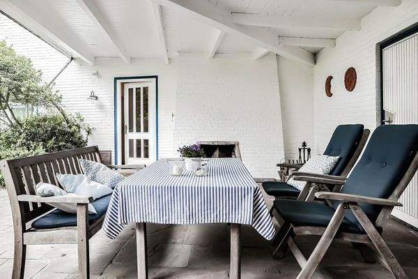 Veranda mit offenem Kamin