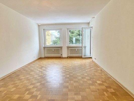 Wohnzimmer mit Zugang zum Wintergarten