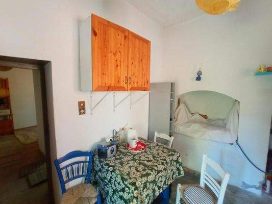 Kreta, Neapoli: Großes Steinhaus mit unvollendetem Gästehaus, Olivenhain und Garten zu verkaufen