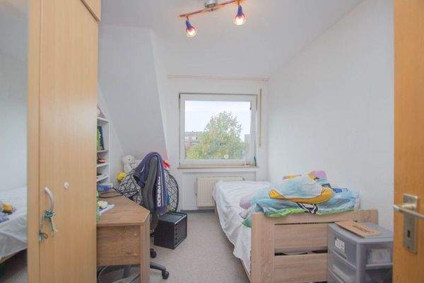 Das Arbeits-/ Kinderzimmer