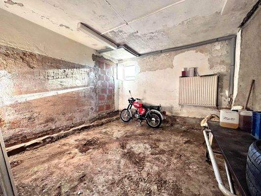 Abstellraum neben Garage