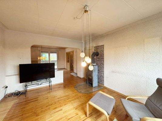 Wohnbereich mit Zugang zum Balkon Obergeschoss