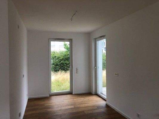 Nelkenweg 13c EG_Zimmer.jpg