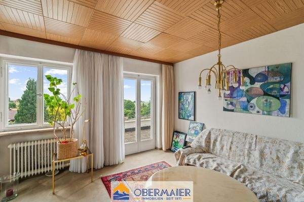 10_Wohnzimmer_EG_Zugang_auf_Nordost_Terrasse