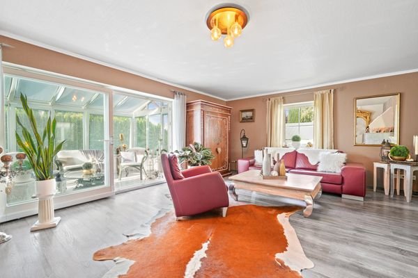 Wohnzimmer mit Wintergarten