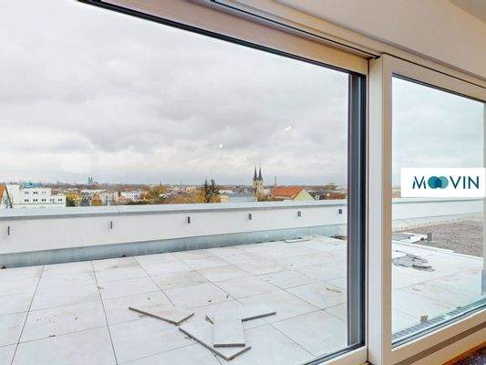 Großzügige Dachterrasse mit Blick über die Stadt