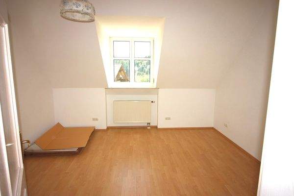 Schlafzimmer W 1 im DG