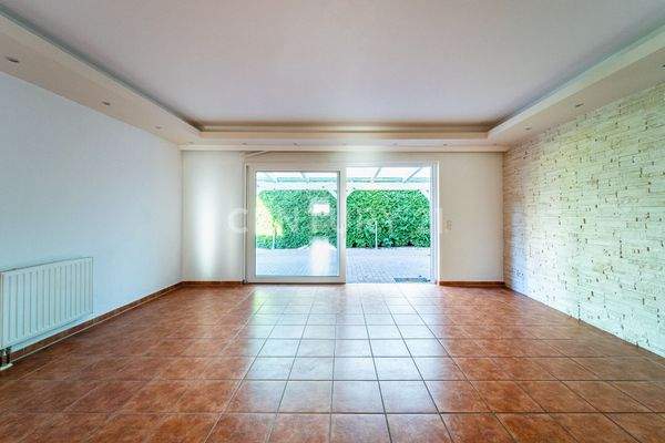 Wohnbereich mit direkten Zugang zur Terrasse