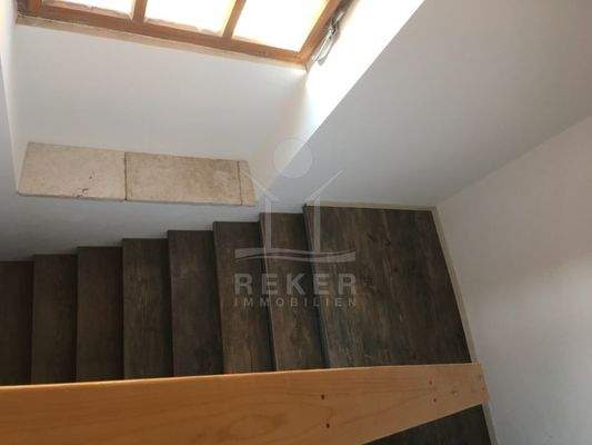 Ein attraktives Treppenhaus führt in die Wohnung