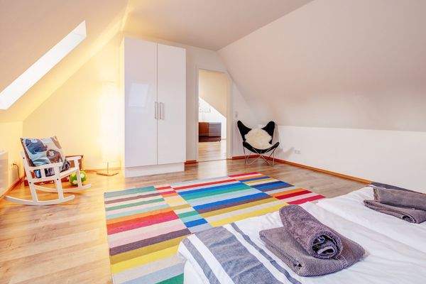 Schlafzimmer im Spitzboden