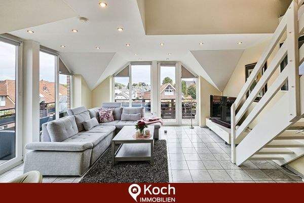  Wohnzimmer mit Balkonzugang