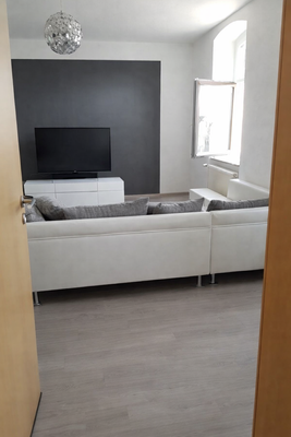 Blick ins Wohnzimmer Erdgeschoss - KI-optimiert.png