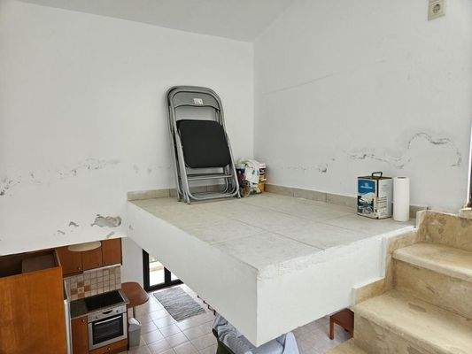 Kreta, Koutouloufari: Haus im Dorfzentrum mit großer Dachterrasse mit herrlichem Blick auf Hersonissos und das Meer zu verkaufen