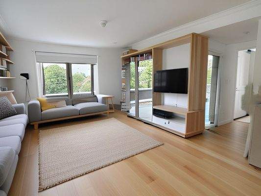 Wohnzimmer mit Zugang zur Dachterrasse - gestaged