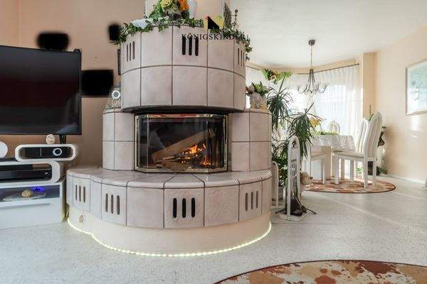 und im Mittelpunkt ein Kaminofen...