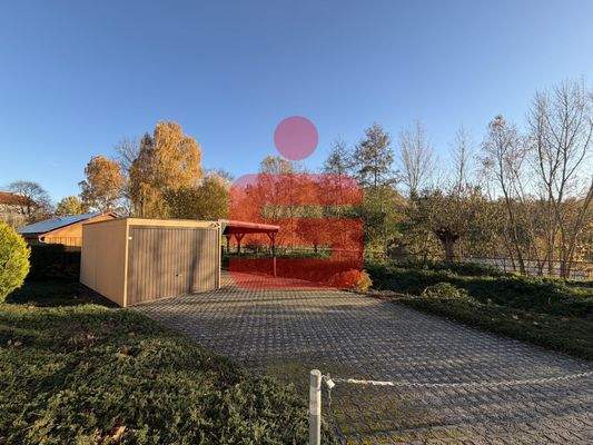 zusätzliches Grundstück mit Garage und Carport