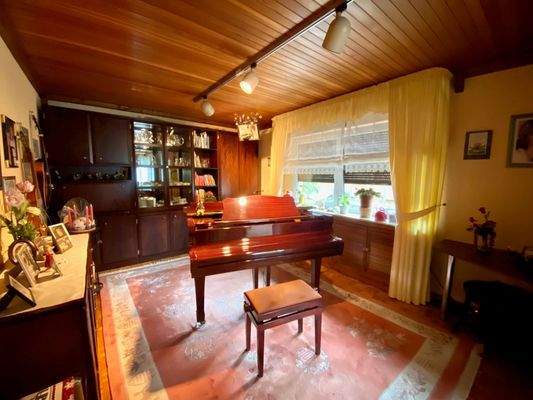 Flügelzimmer an Wohnbereich