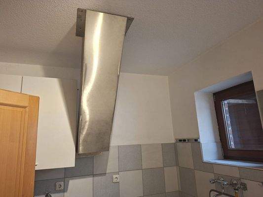 Hauswirtschaftsraum mit Wäscherutsche