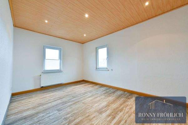 Schlafzimmer an Küche